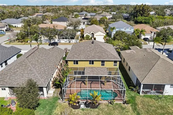 an aerial view of a house with a garden