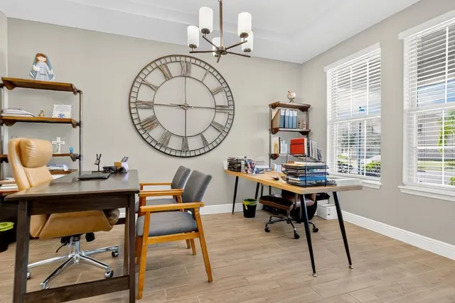 a kitchen with stainless steel appliances a sink stove and cabinets