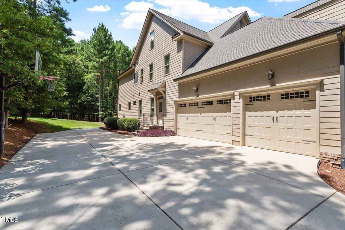 124 Dartmoor Lane Raleigh, NC 27614 - Photo 63 of 64 Side-Entry 3-Car Garage
