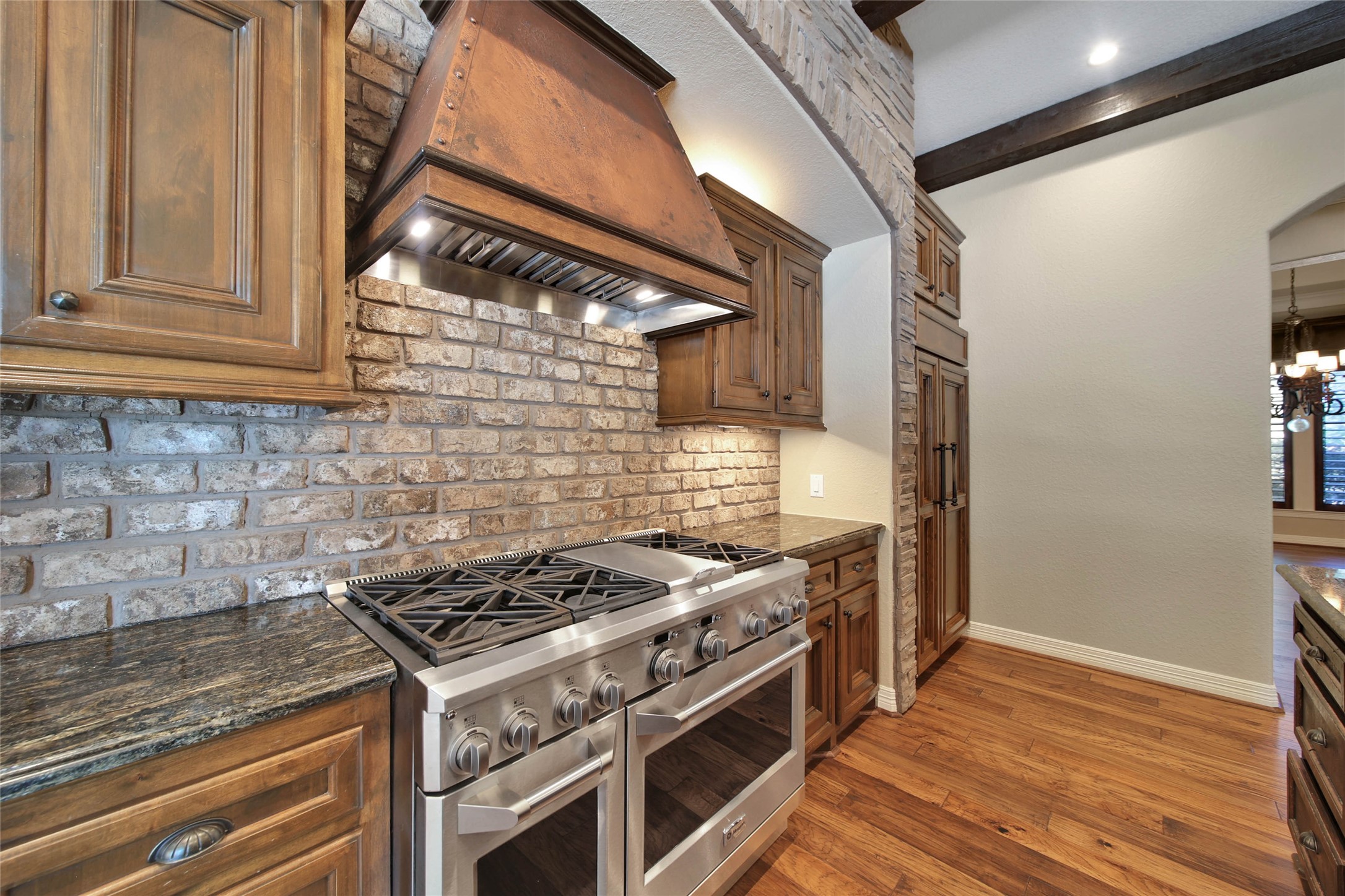 6803 Star Ledge Court Spring, TX 77389 - Photo 13 of 48 Chef's kitchen includes six burner gas range with griddle and double ovens!