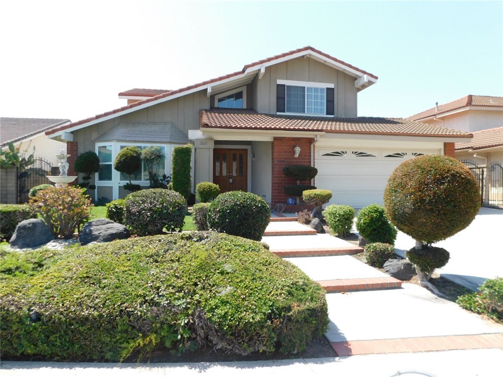 2618 Athena Place Fullerton, CA 92833 - Photo 1 of 27 a view of a house with a yard