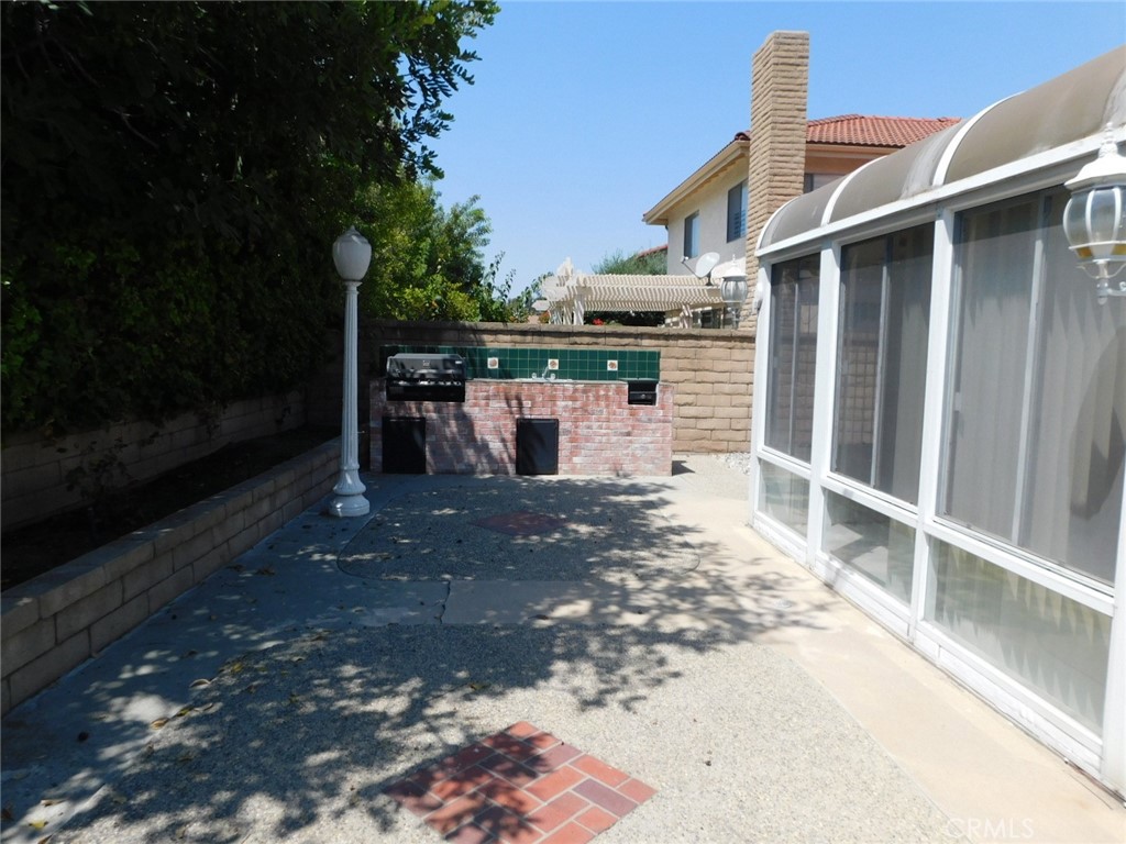 2618 Athena Place Fullerton, CA 92833 - Photo 15 of 27 a front view of a house with a yard