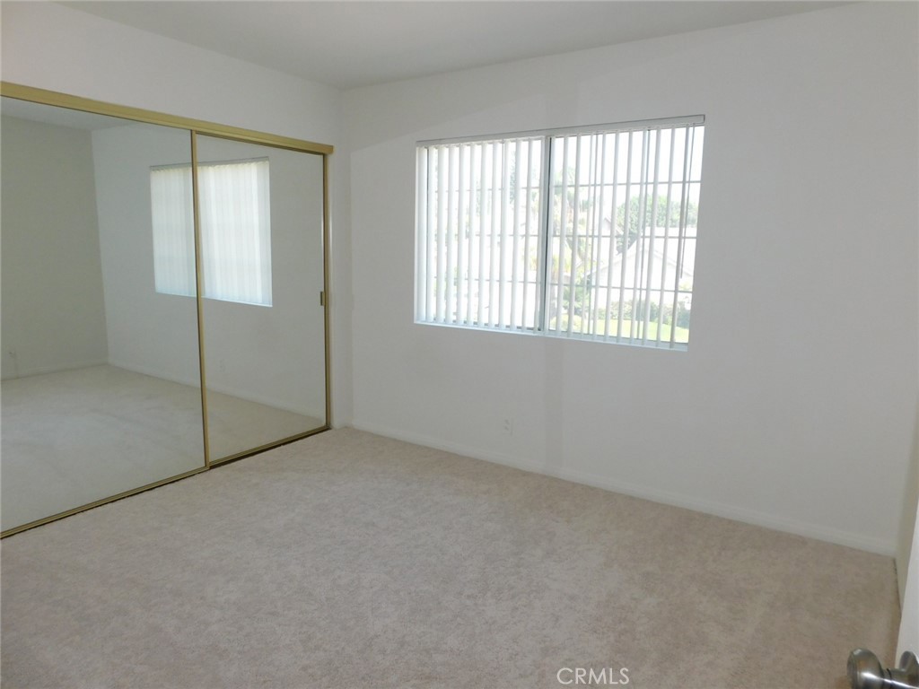 2618 Athena Place Fullerton, CA 92833 - Photo 23 of 27 an empty room with windows
