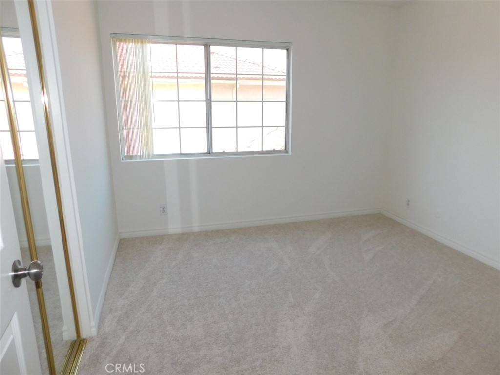 2618 Athena Place Fullerton, CA 92833 - Photo 25 of 27 an empty room with a window