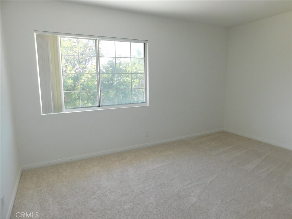 2618 Athena Place Fullerton, CA 92833 - Photo 26 of 27 an empty room with a window