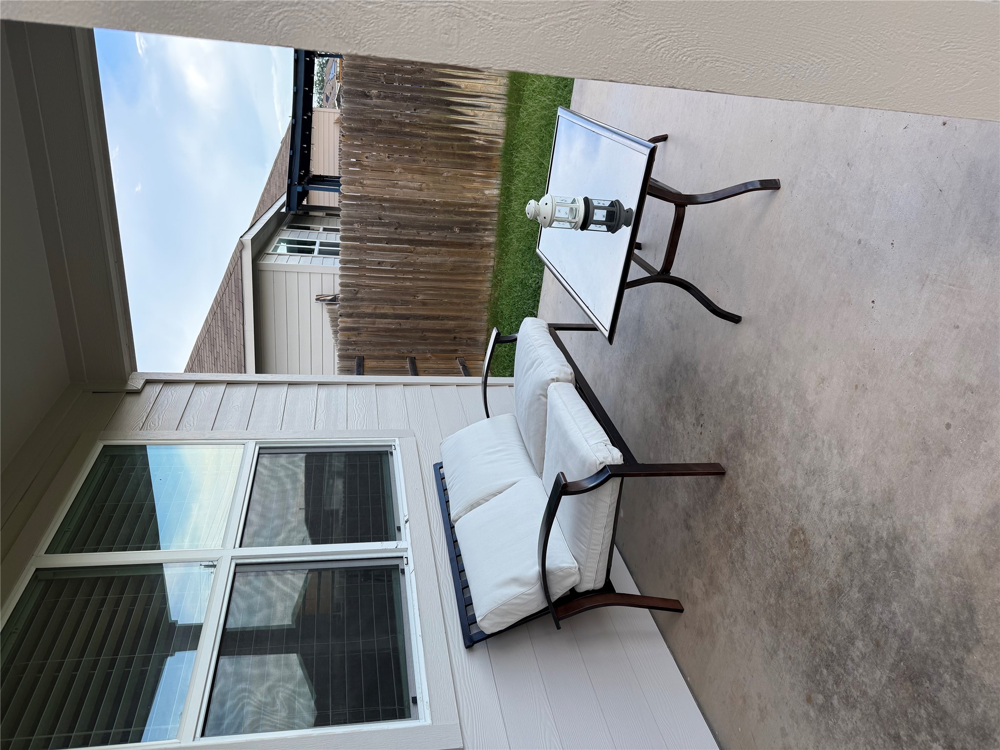 14907 Retha Pass Austin, TX 78725 - Photo 5 of 22 Enjoy quiet moments on this welcoming covered patio space.
