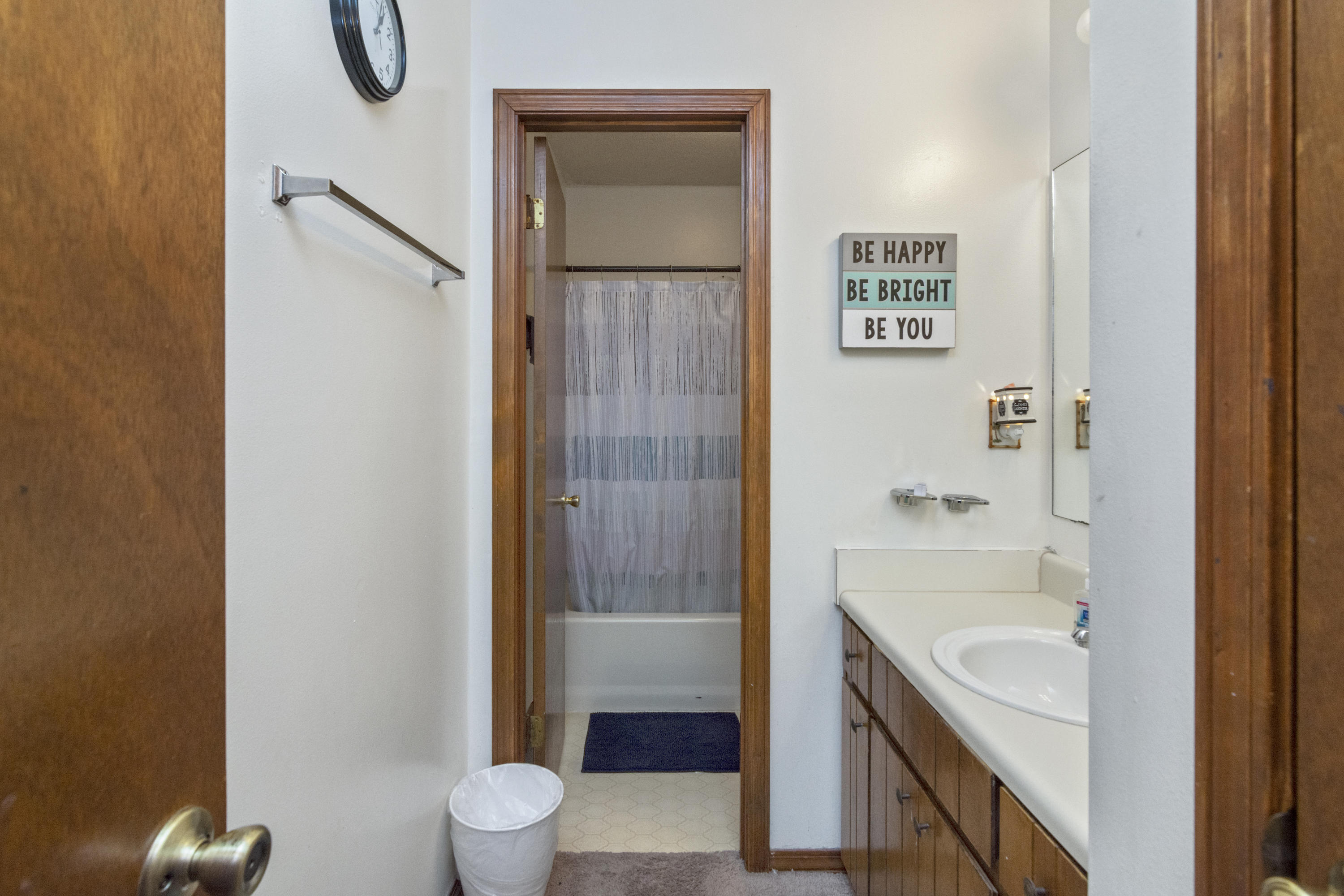 414 Ashley Drive Crestview, FL 32536 - Photo 14 of 29 a bathroom with a sink a toilet and shower