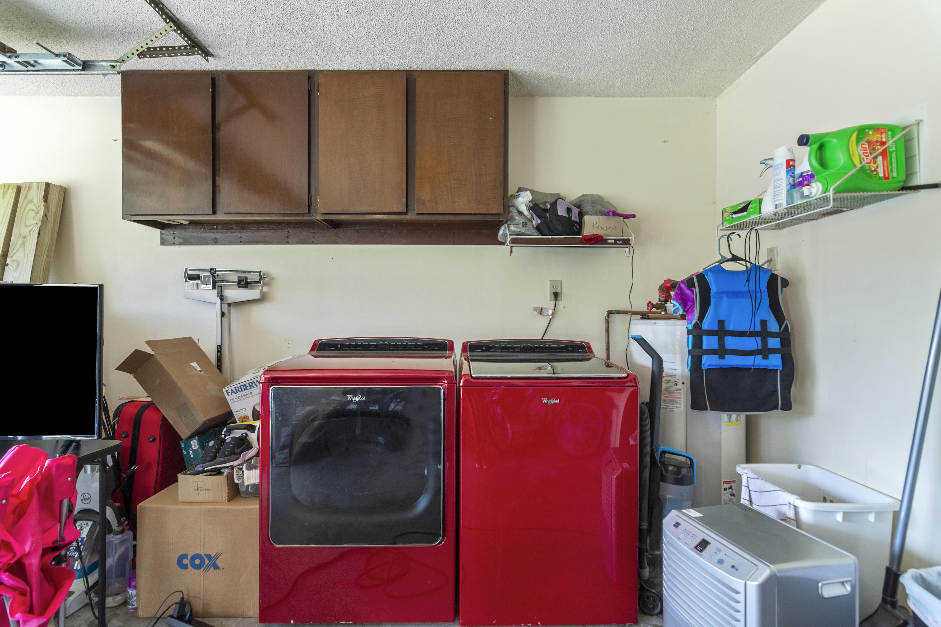 414 Ashley Drive Crestview, FL 32536 - Photo 20 of 29 a utility room with dryer washer and a view of living room