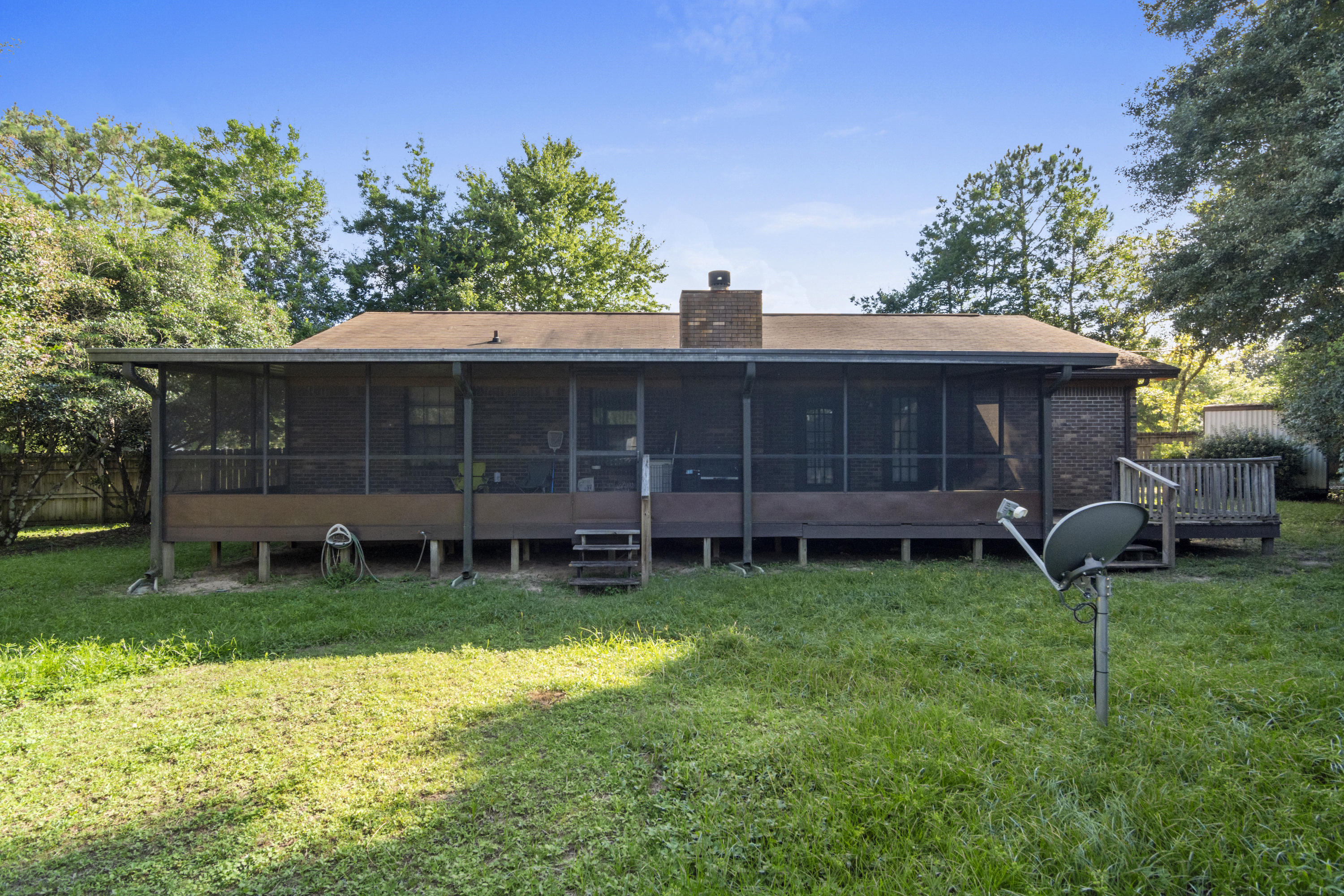 414 Ashley Drive Crestview, FL 32536 - Photo 29 of 29 a view of a house with a backyard