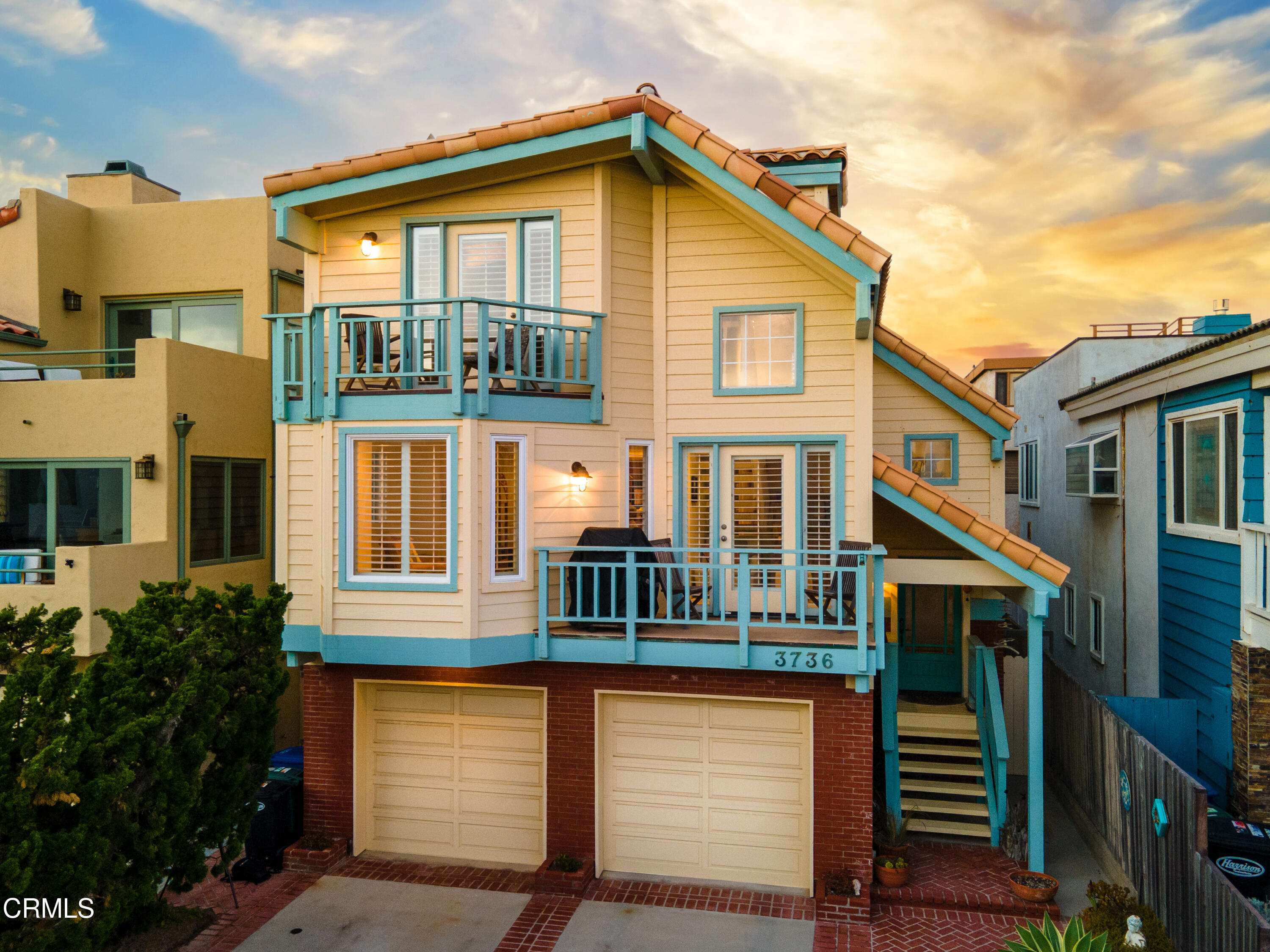 3736 Ocean Drive Oxnard, CA 93035 - Photo 22 of 35 a front view of a house with a yard