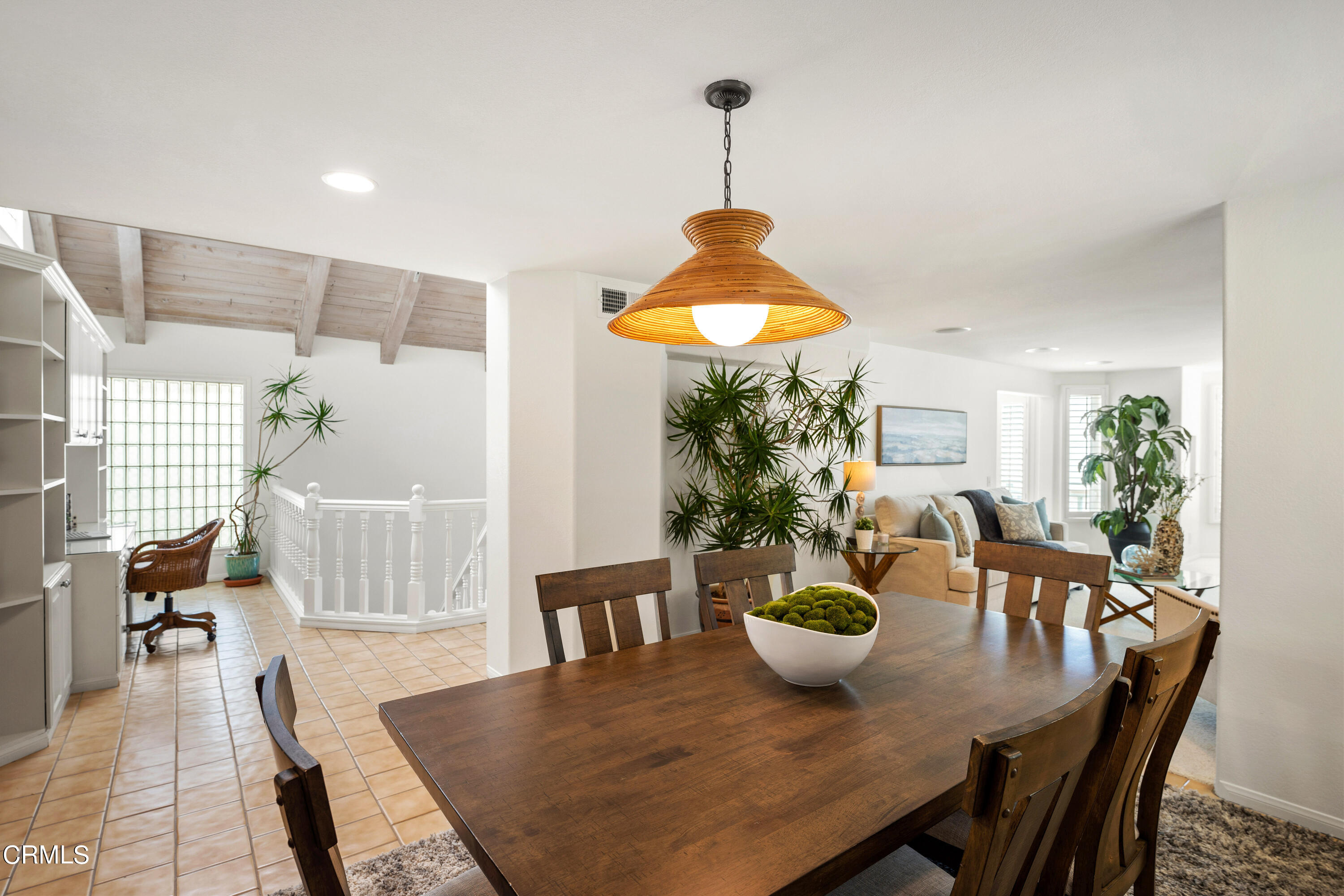 3736 Ocean Drive Oxnard, CA 93035 - Photo 7 of 35 a view of a dining room with furniture window and wooden floor