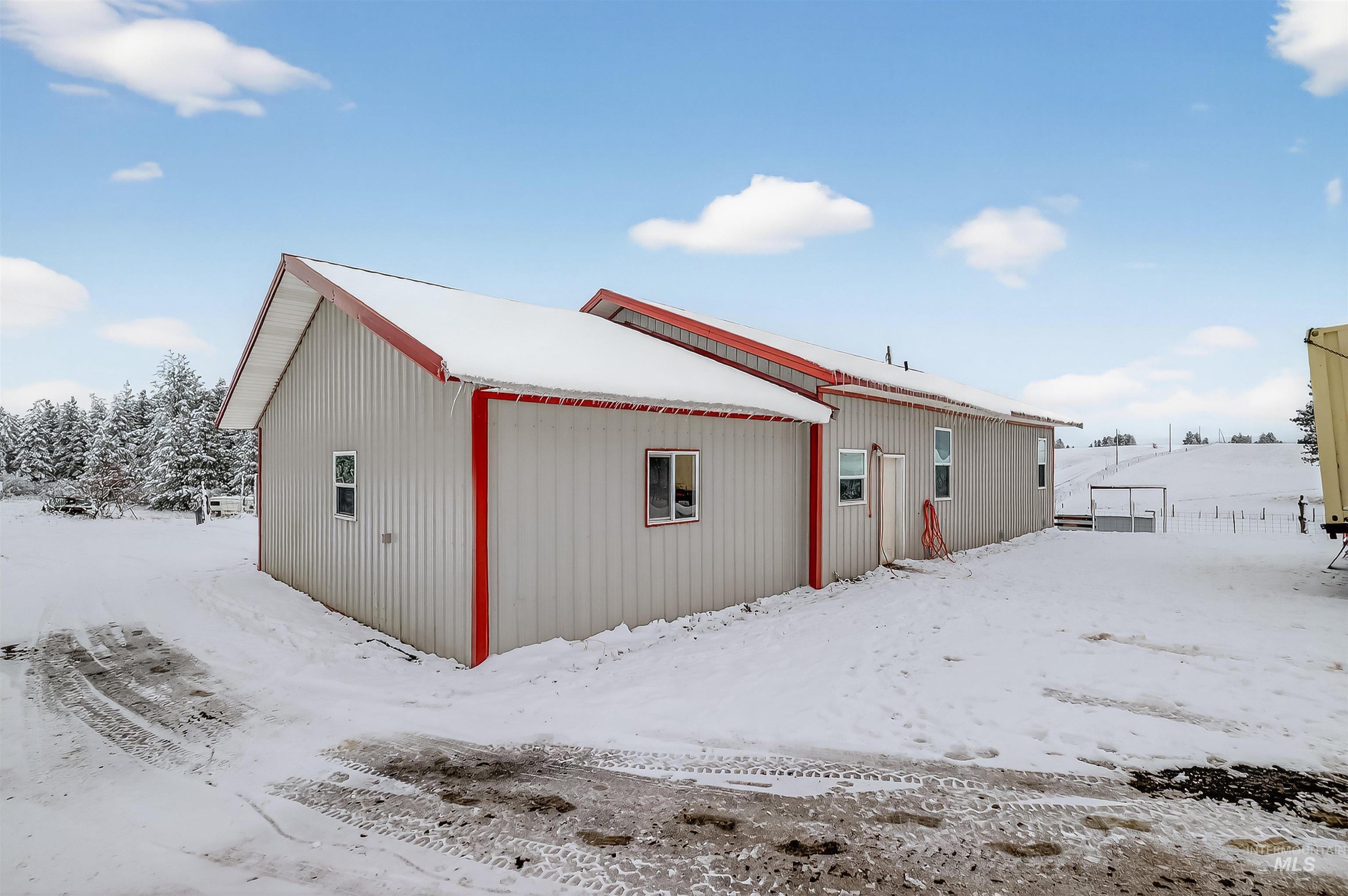 1585 Woodside Road Winchester, ID 83555 - Photo 20 of 47 View of snow covered rear of property