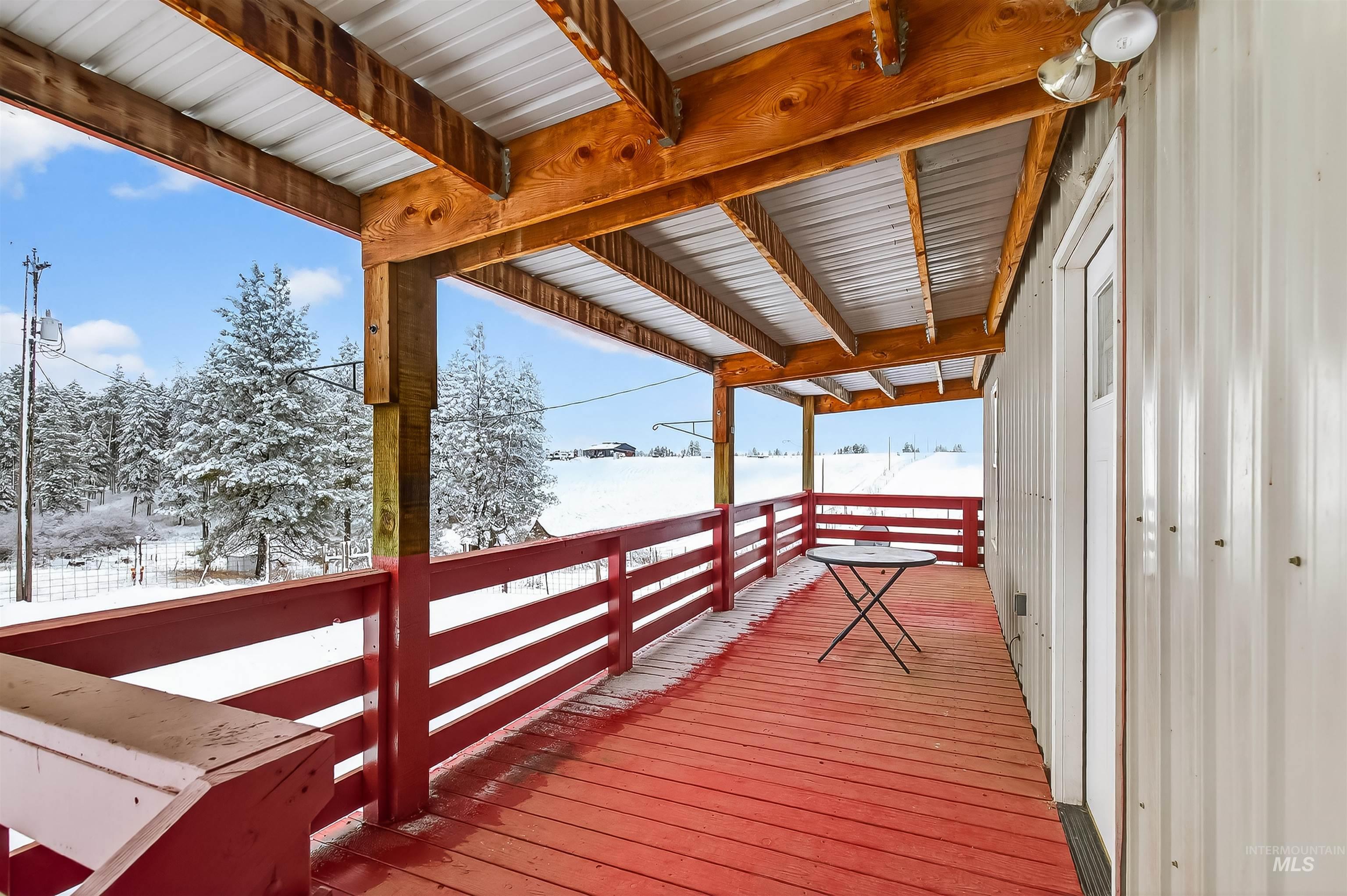 1585 Woodside Road Winchester, ID 83555 - Photo 21 of 47 View of snow covered deck