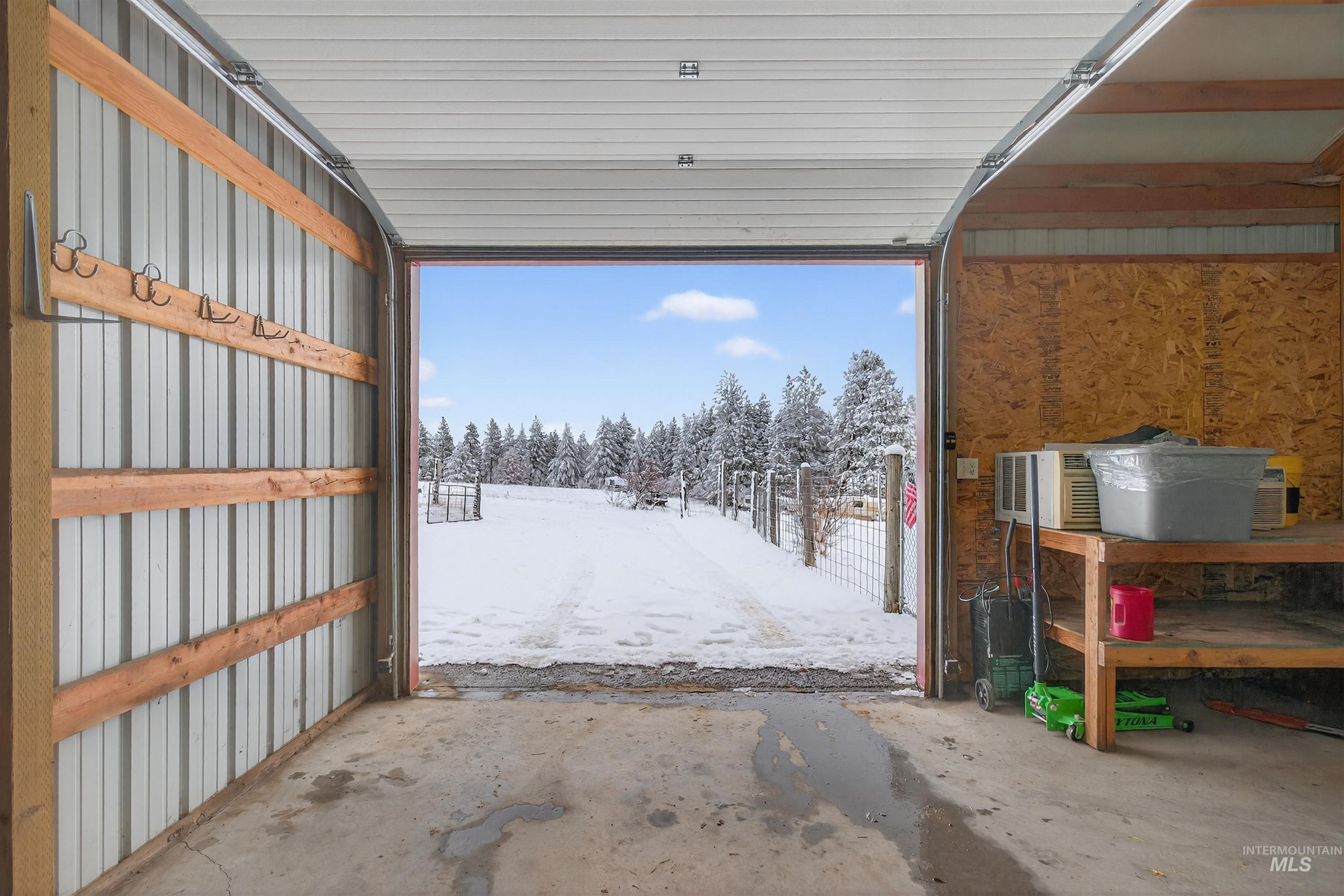 1585 Woodside Road Winchester, ID 83555 - Photo 22 of 47 View of snow covered garage