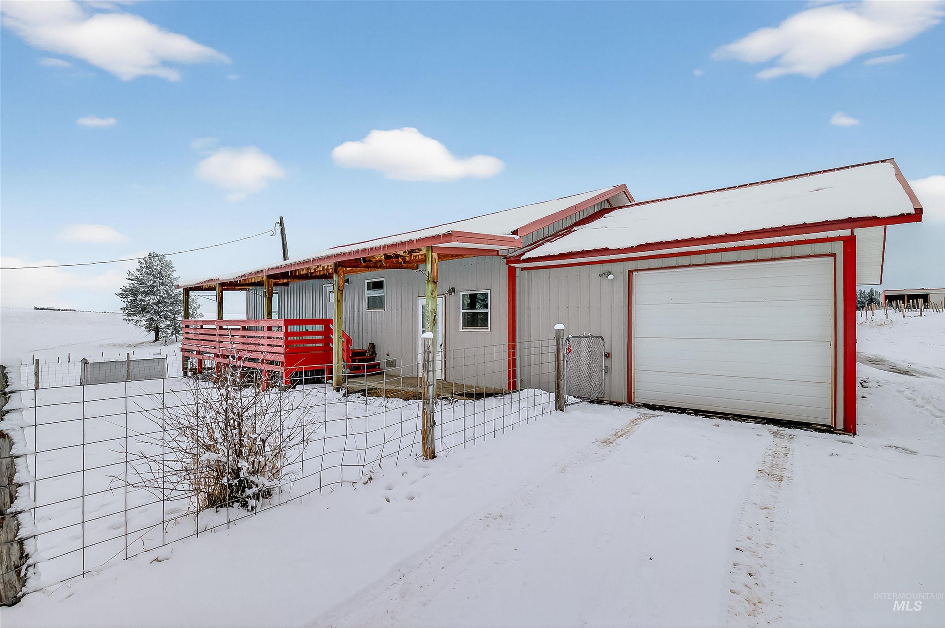 1585 Woodside Road Winchester, ID 83555 - Photo 5 of 47 View of front of home featuring a garage