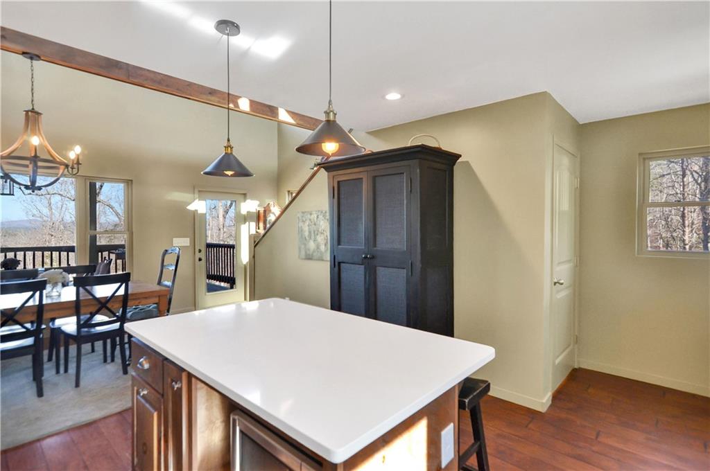 196 Grayson Point Blue Ridge, GA 30513 - Photo 12 of 42 a kitchen with a table and chairs