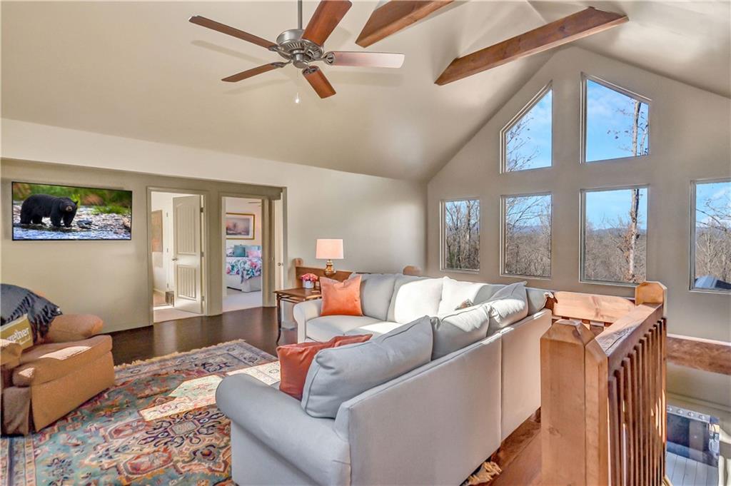 196 Grayson Point Blue Ridge, GA 30513 - Photo 3 of 42 a living room with furniture and a large window