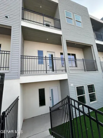 a view of a brick house with a window