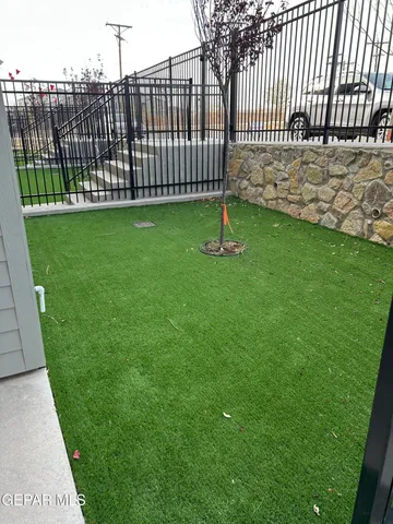 a view of a backyard with a garden