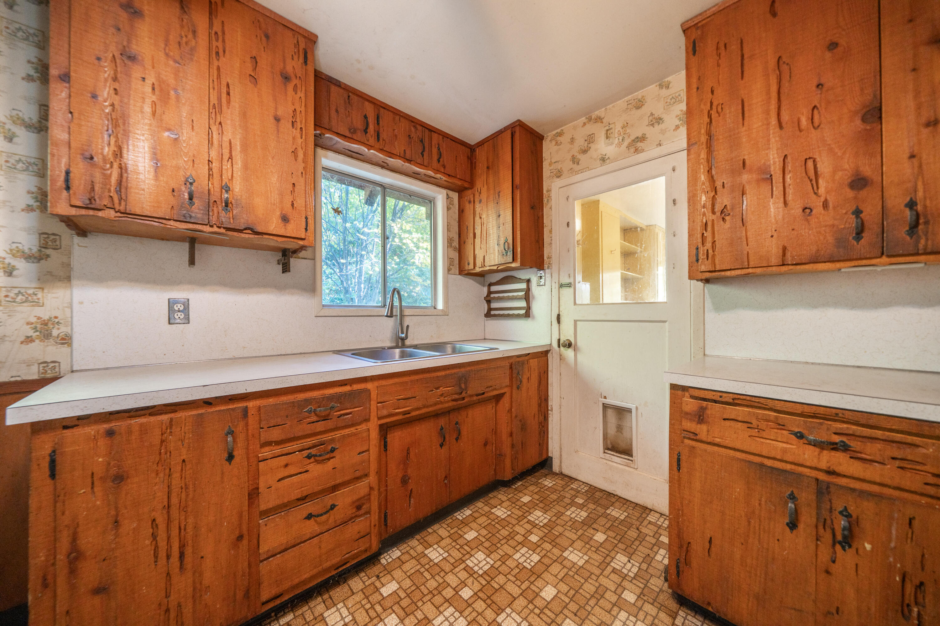 20389 Our Road Lakehead, CA 96051 - Photo 4 of 92 a kitchen with stainless steel appliances granite countertop a sink and cabinets with wooden floor