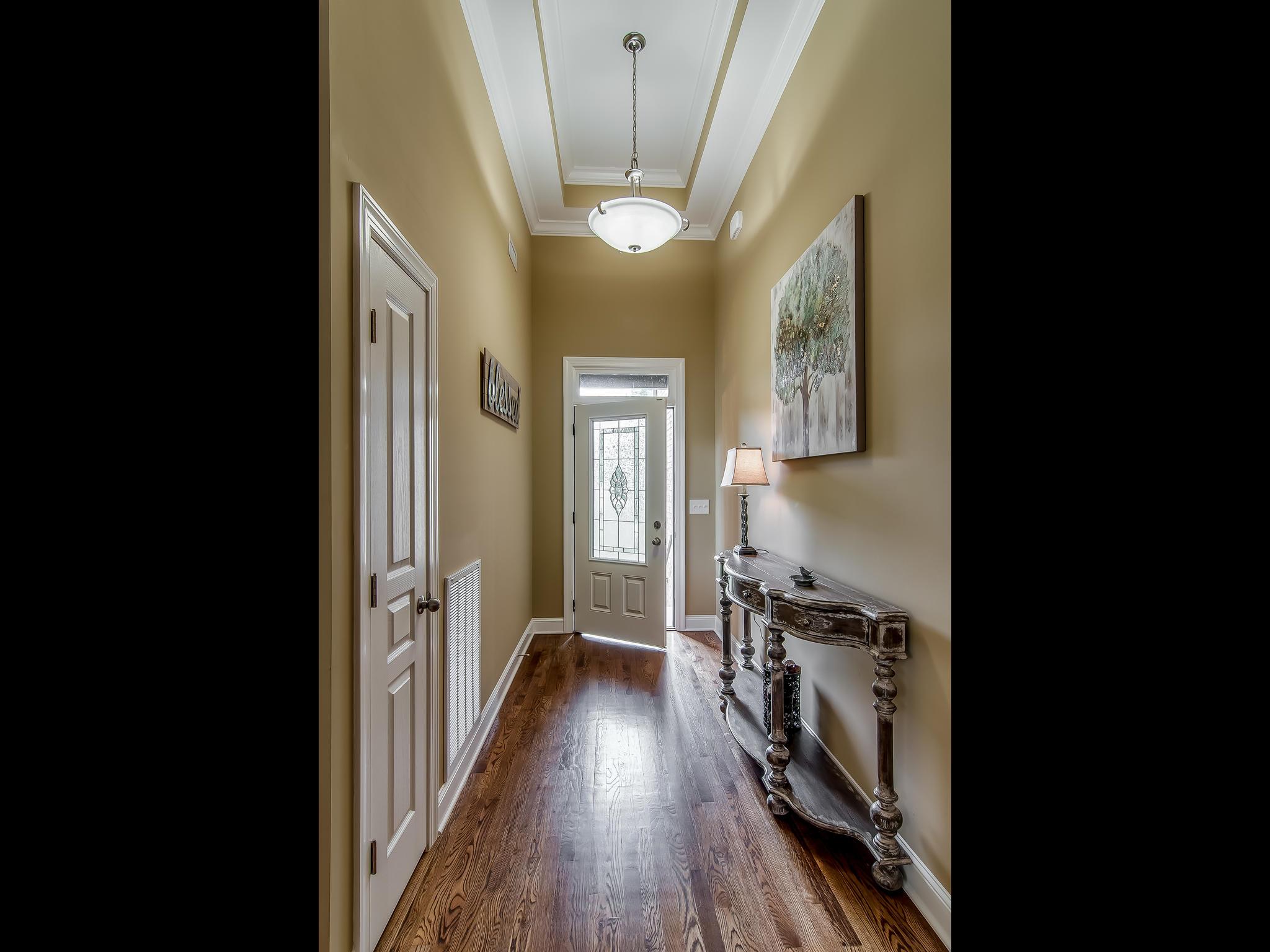2235 Harkreader Road Mount Juliet, TN 37122 - Photo 3 of 23 a view of a hallway view with wooden floor and staircase