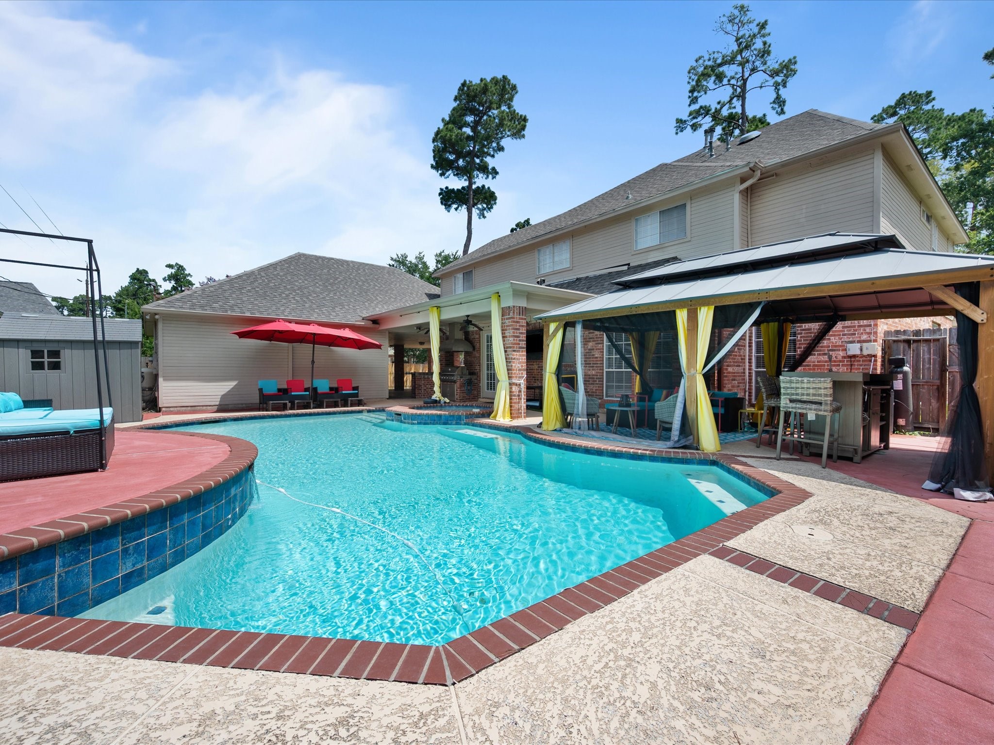 16123 Lafone Drive Spring, TX 77379 - Photo 40 of 47 With its resort-inspired pool, spacious pavilion, and beautifully designed outdoor living areas, this backyard offers an extraordinary extension of the home.
