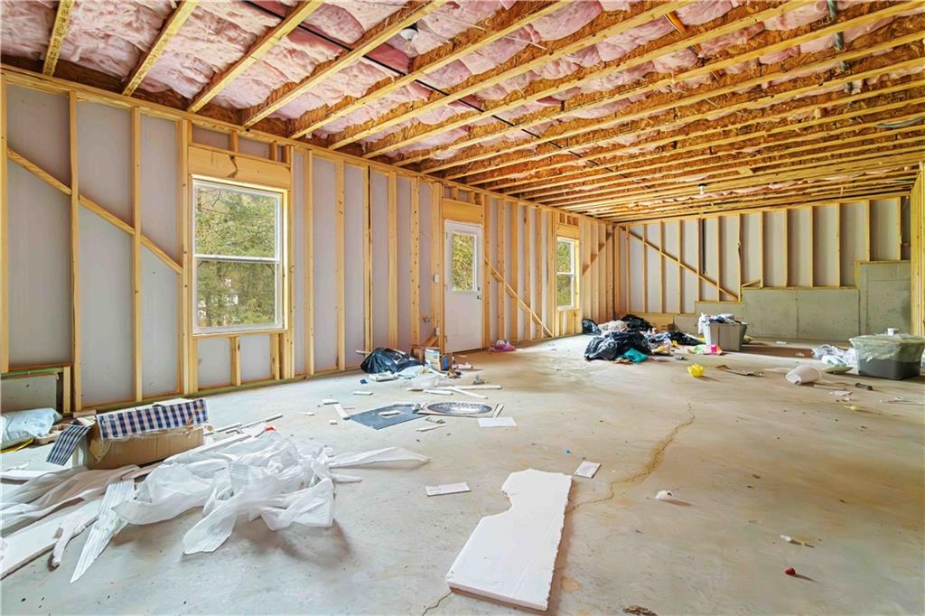 355 Chestnut Chase Hoschton, GA 30548 - Photo 19 of 22 a view of a lounge chair in the patio