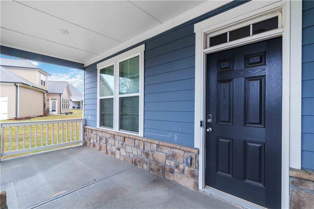 355 Chestnut Chase Hoschton, GA 30548 - Photo 2 of 22 a view of front door of house