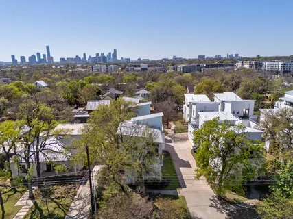 an aerial view of a city with lots of residential buildings