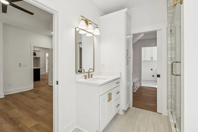 a bathroom with a sink and a mirror