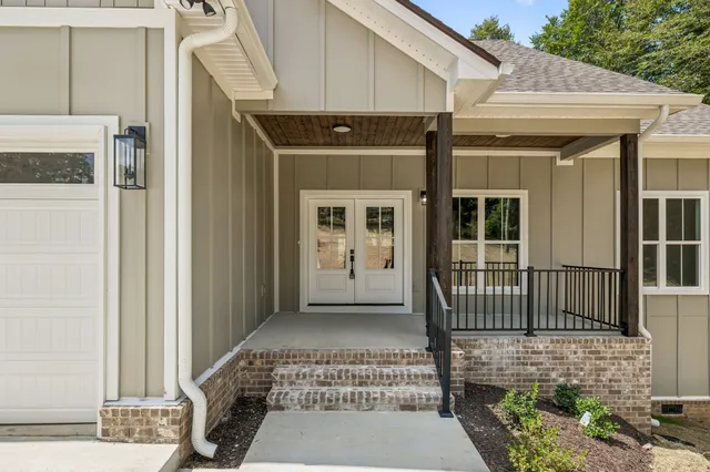 a view of a house with a porch