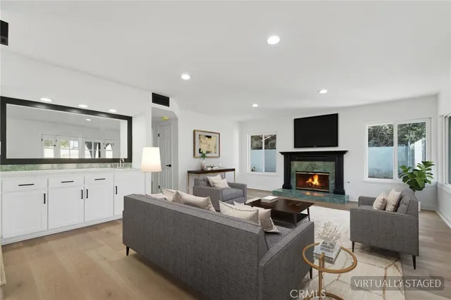 a view of a kitchen with a dishwasher kitchen stove and cabinets
