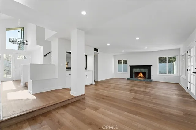a kitchen with stainless steel appliances granite countertop a sink and stove top oven