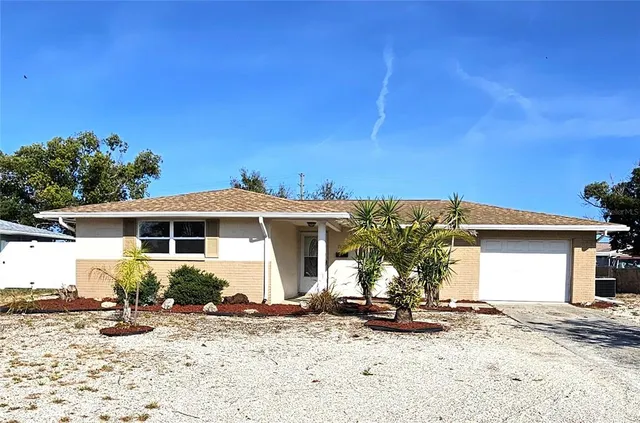 a view of a house with a patio