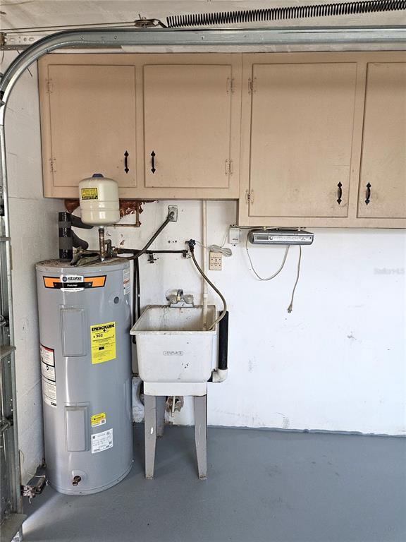 7821 Lotus Drive Port Richey, FL 34668 - Photo 18 of 19 a view of a storage and utility room with a sink