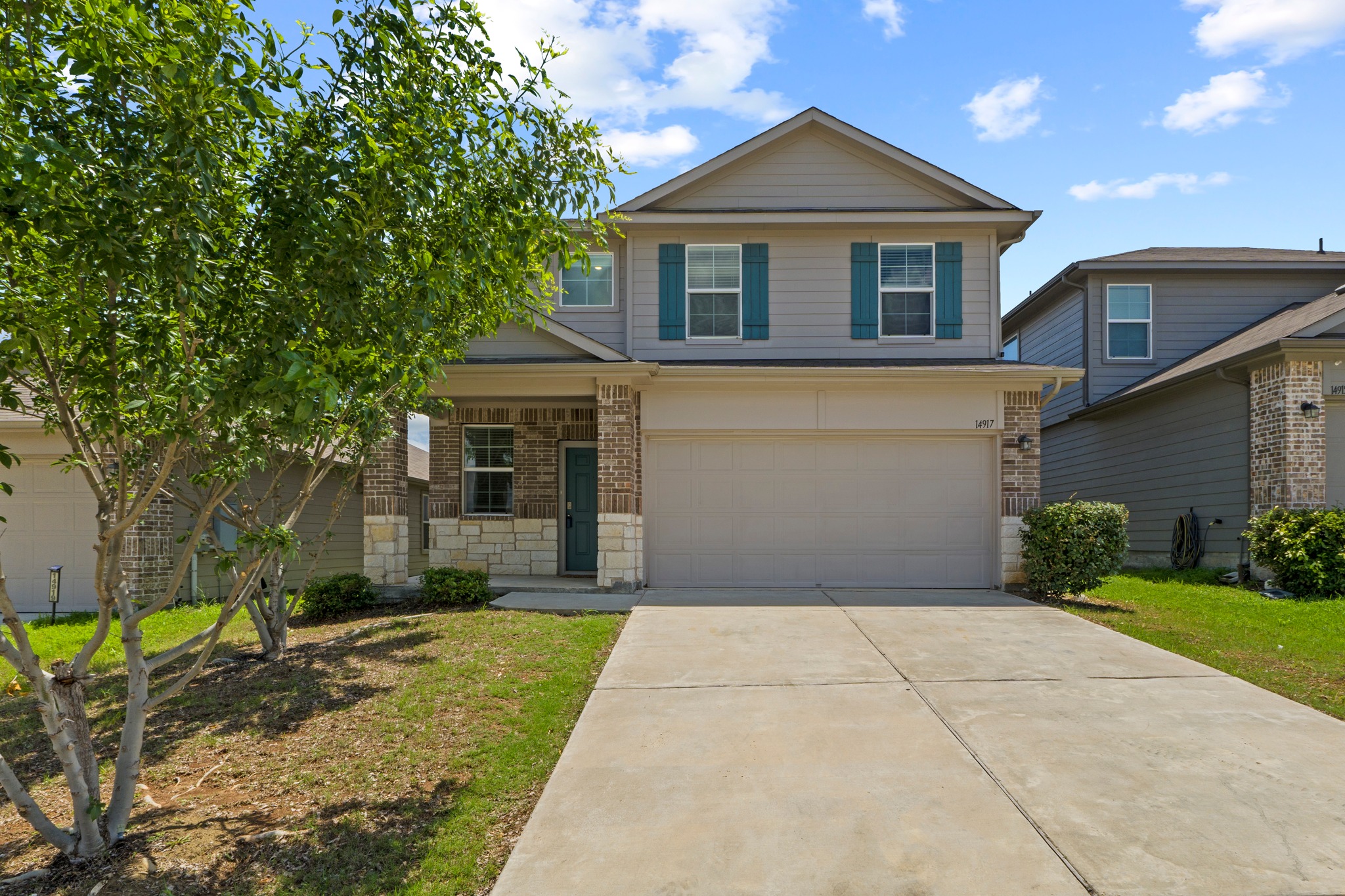 14917 Bajada Rd Manor Manor, TX 78653 - Photo 1 of 31 Two-story residence featuring a combination exterior of brick, stone, and siding