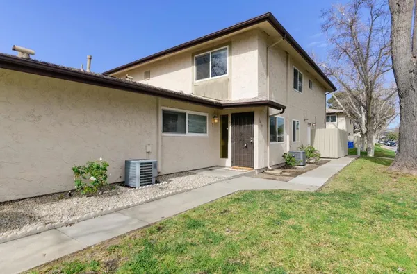 a front view of a house with patio