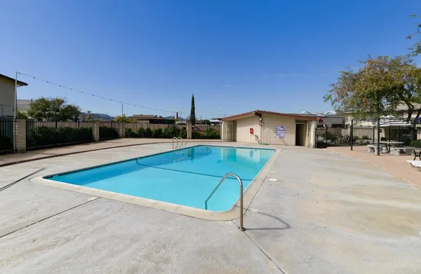 a view of a house with a swimming pool