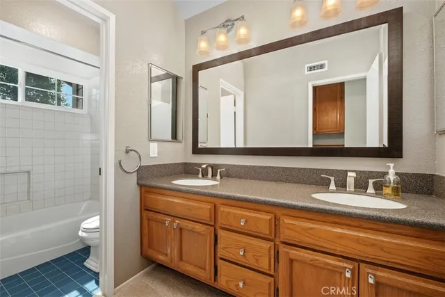a view of a chairs and table on the wooden floor