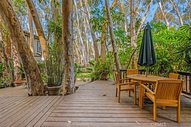 a view of a backyard with sitting area