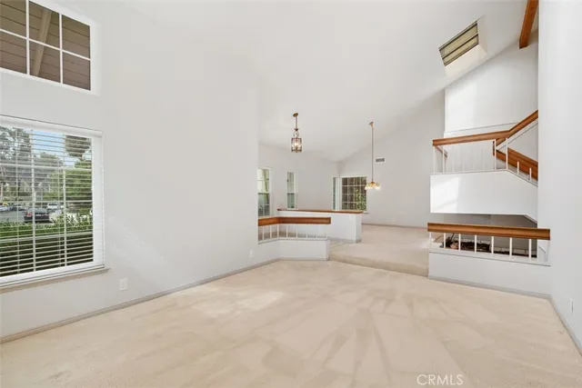 a spacious bathroom with a tub and mirror