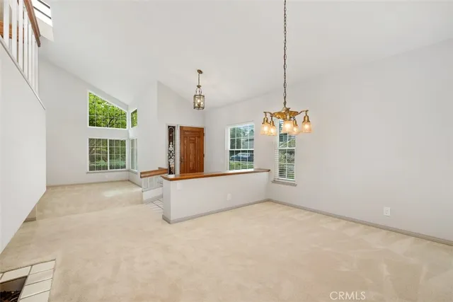 a view of a kitchen with a sink and cabinets