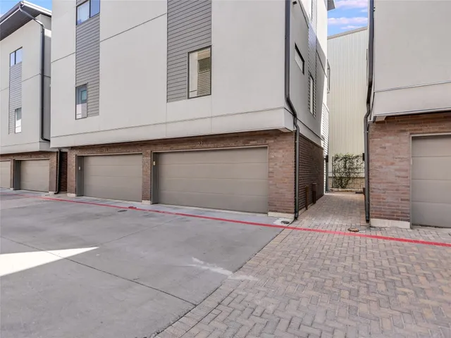 a view of a house with a parking area