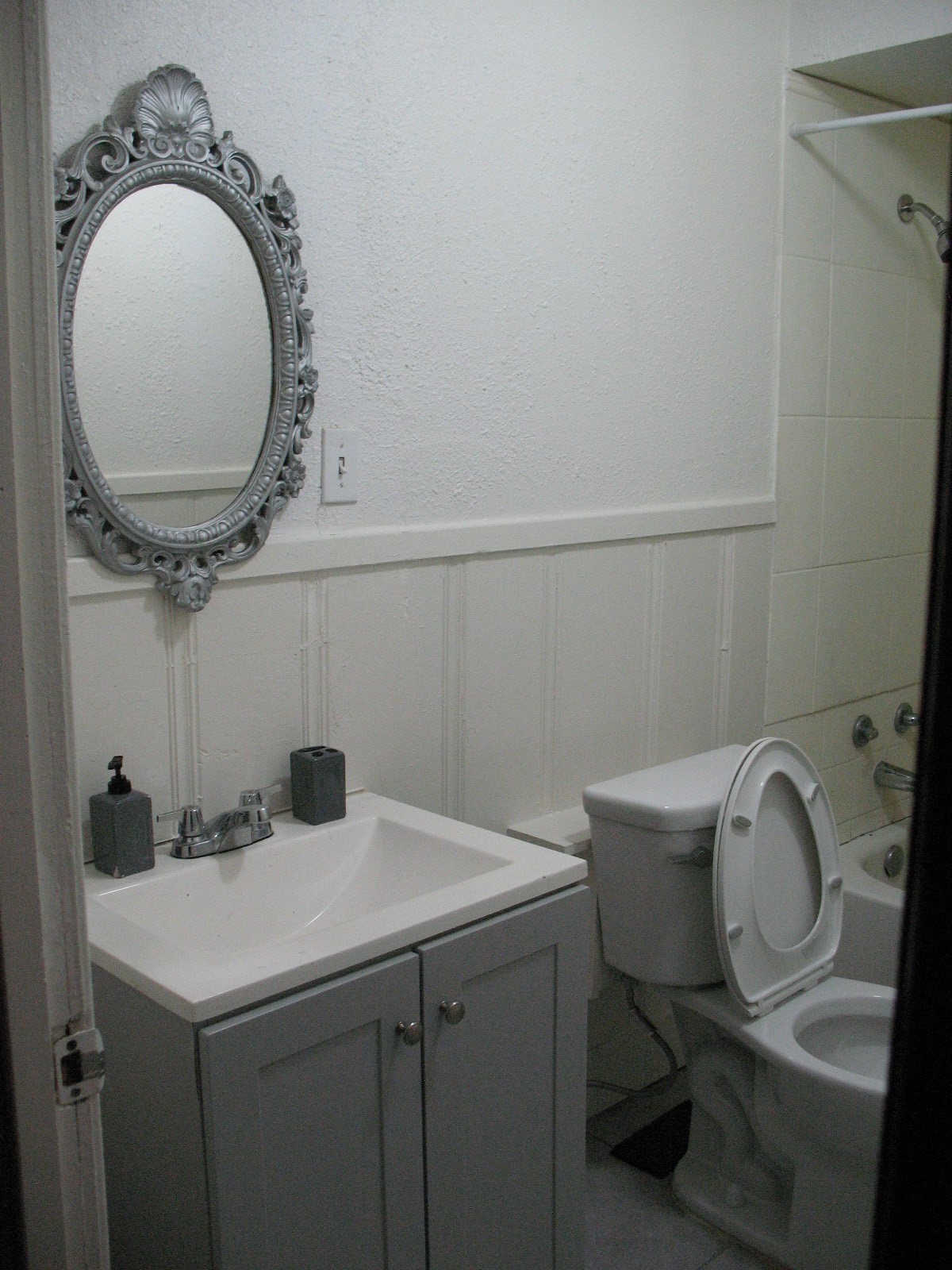 2610 Scott Street Houston, TX 77004 - Photo 5 of 11 a bathroom with a sink and a mirror