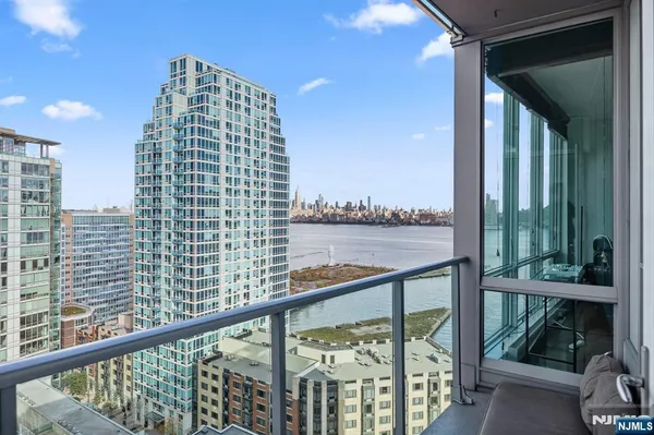 a view of balcony with city view