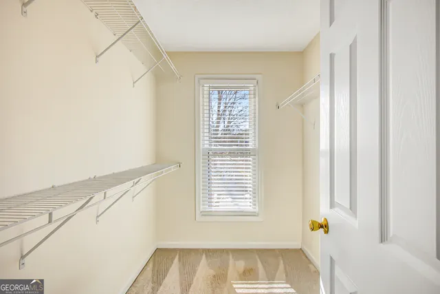 a view of a room that has a window in it