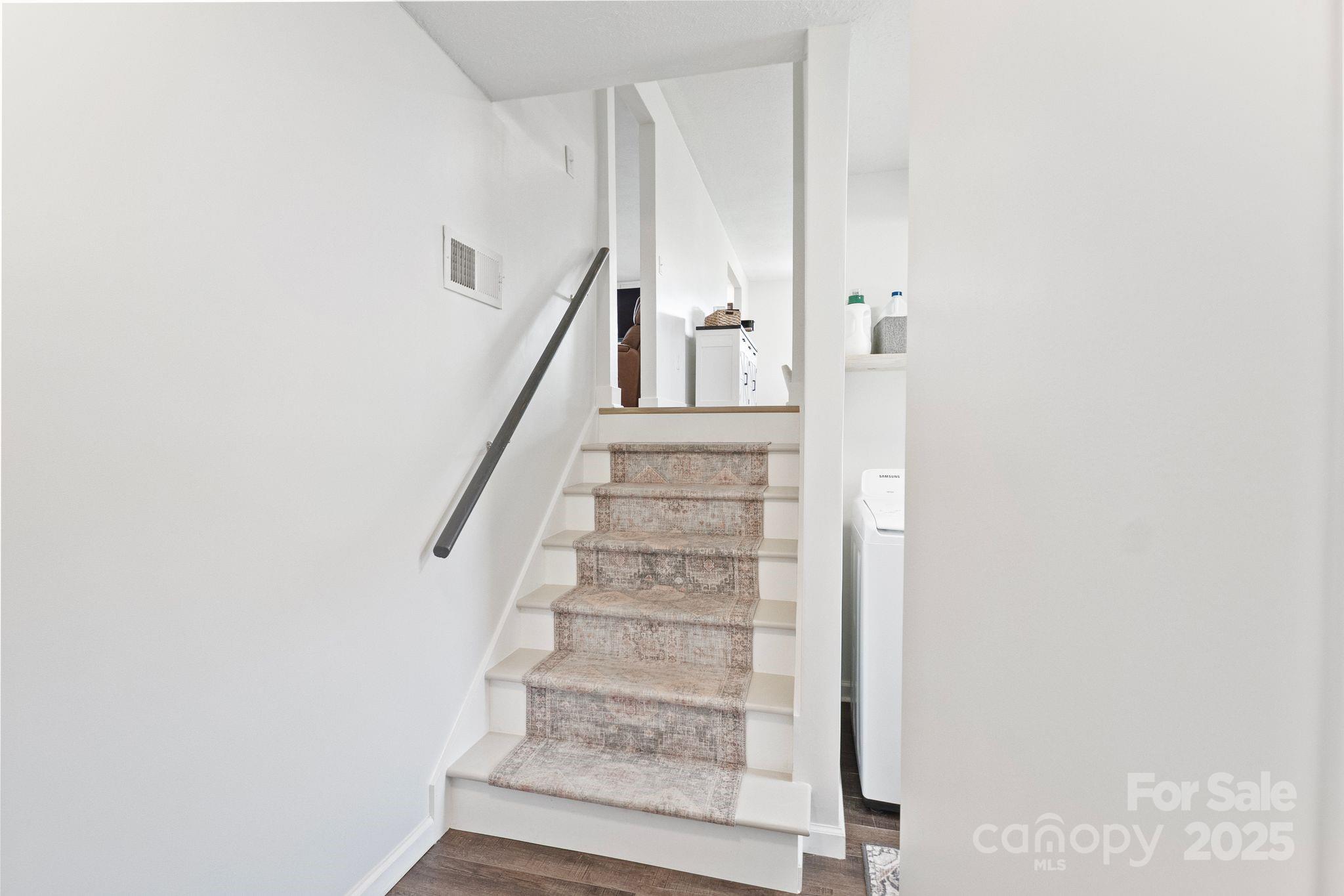 5703 Valley Field Road Southeast Hickory, NC 28602 - Photo 11 of 33 a view of staircase with white walls and white walls