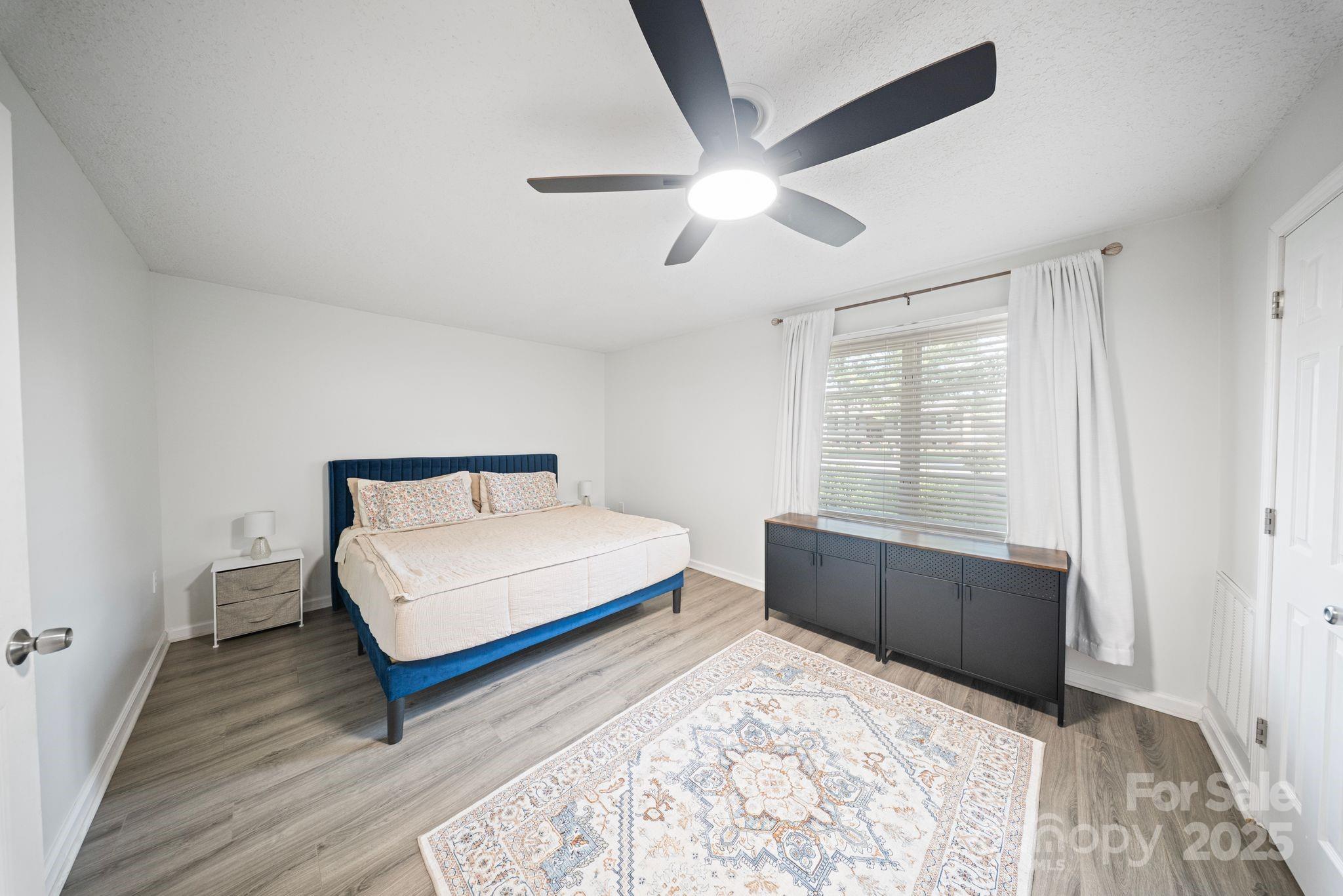 5703 Valley Field Road Southeast Hickory, NC 28602 - Photo 14 of 33 a bedroom with a bed and window