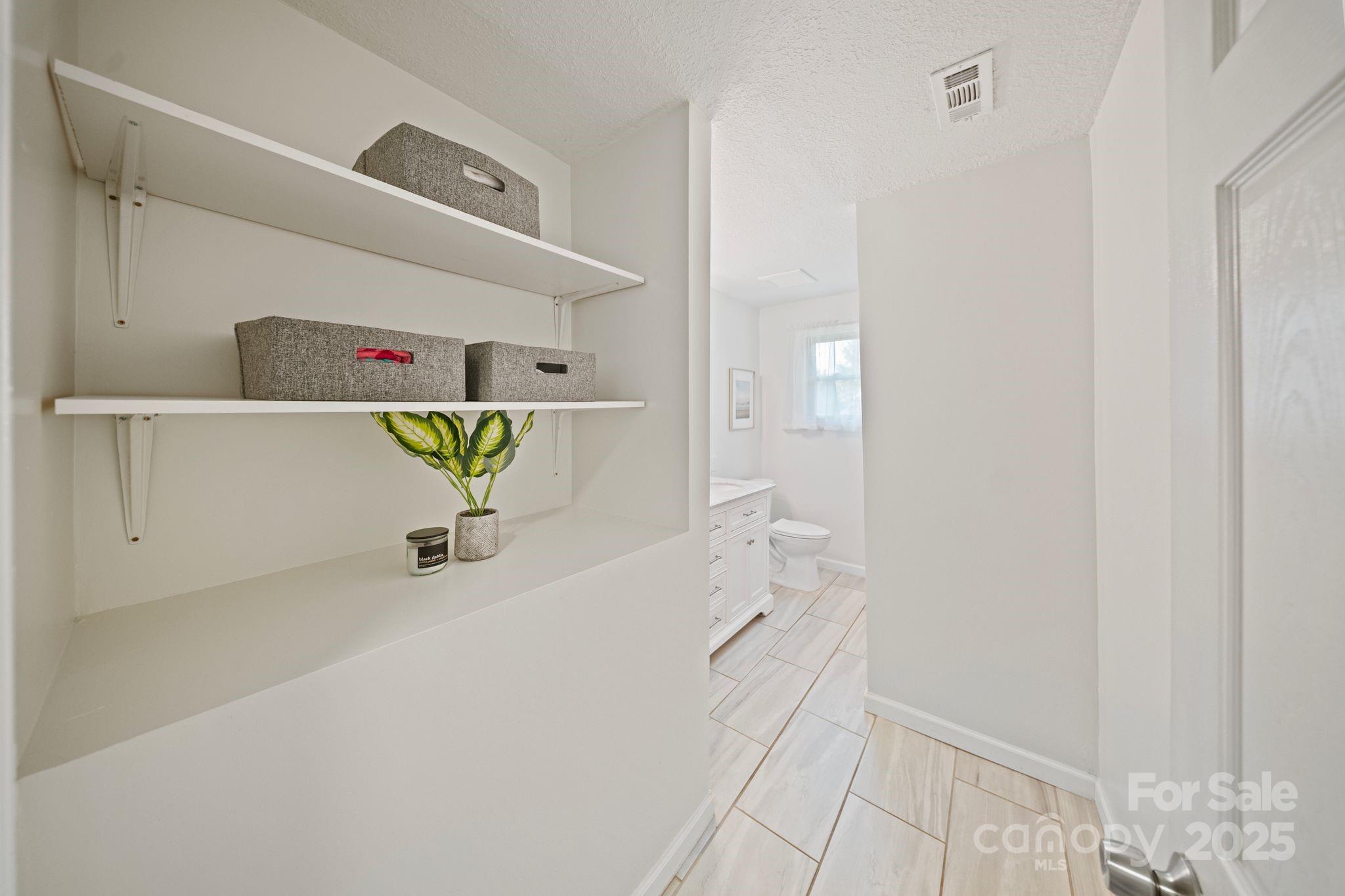 5703 Valley Field Road Southeast Hickory, NC 28602 - Photo 20 of 33 a bathroom with a bathtub and a sink