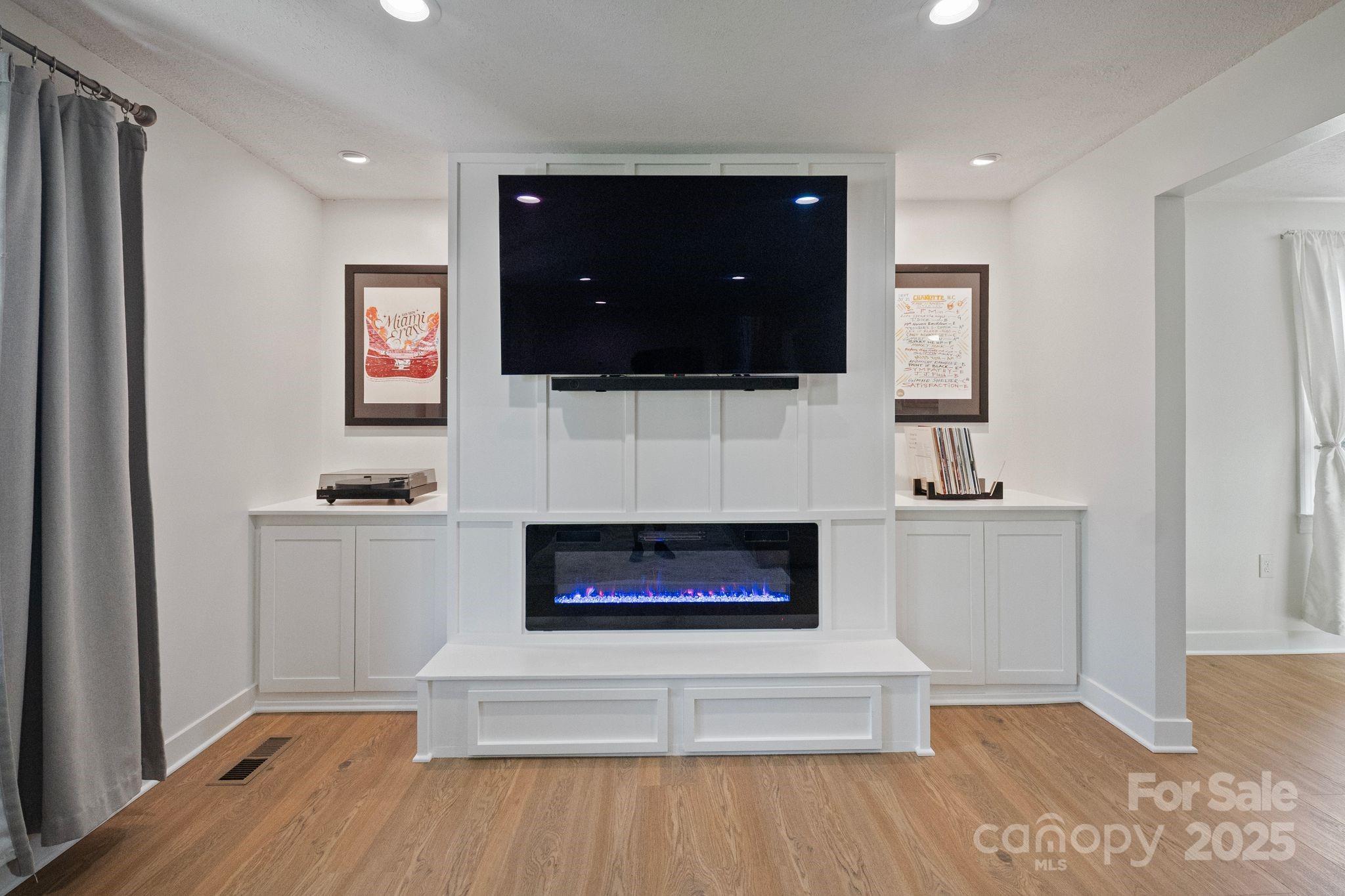 5703 Valley Field Road Southeast Hickory, NC 28602 - Photo 7 of 33 a living room with furniture and a fireplace